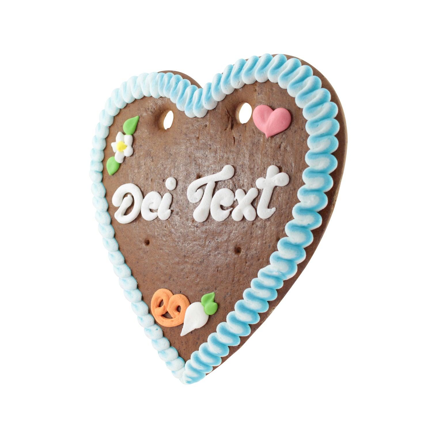 Herzförmiges Lebkuchen mit weißer Zuckerschrift und rosafarbenem Rand, handgefertigt, ca. 22 x 23 cm.