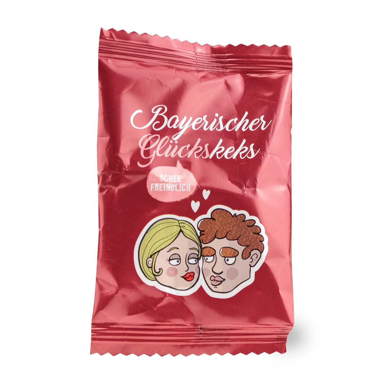 Designbox in Weiß und Blau mit Herzmotiv, enthält einzeln verpackte braune Glückskekse mit roten Etiketten.