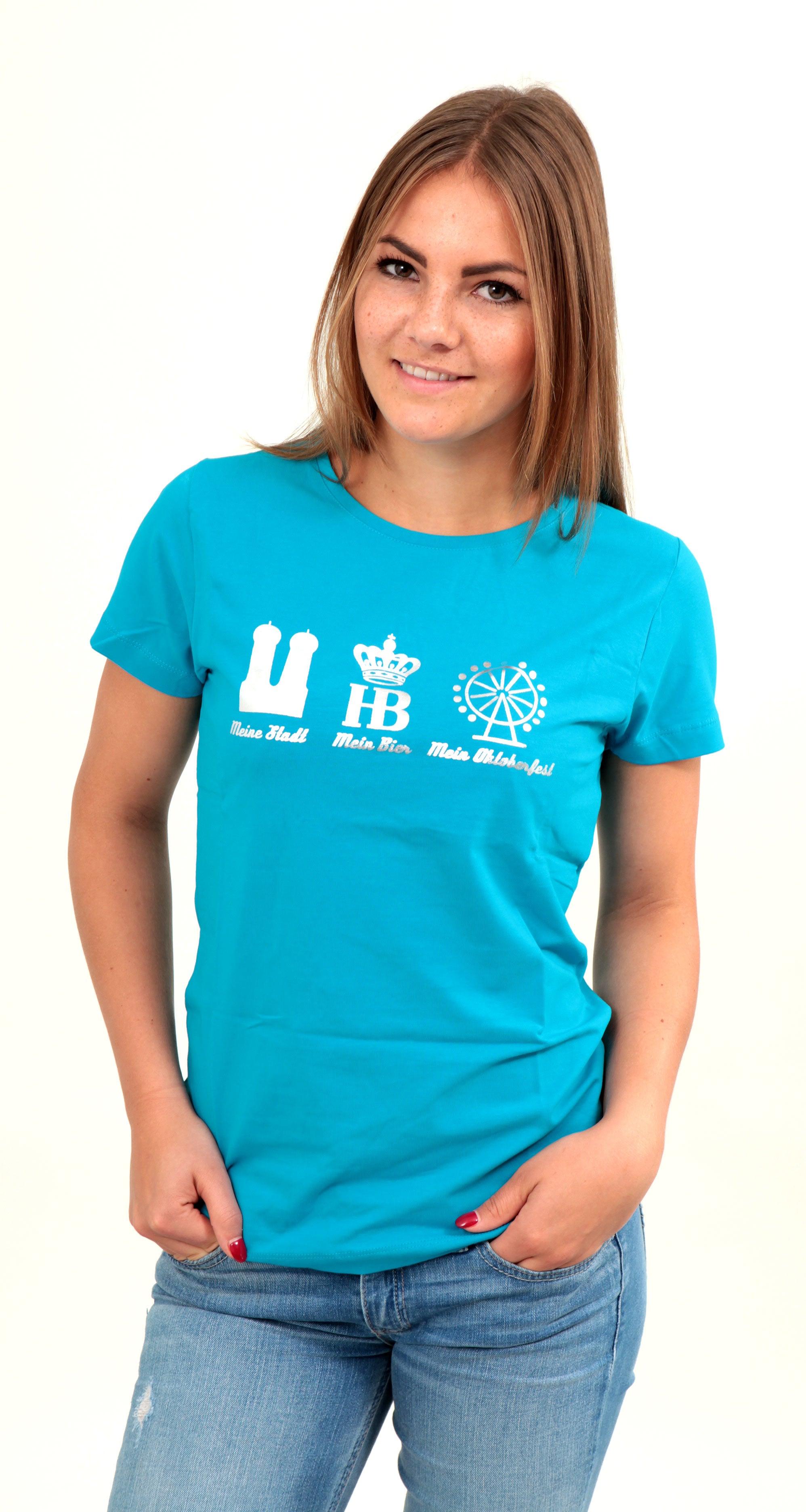 Tailliertes Damenshirt in Türkis mit silber glänzendem „Mein Oktoberfest“-Schriftzug, aus Baumwollmix.