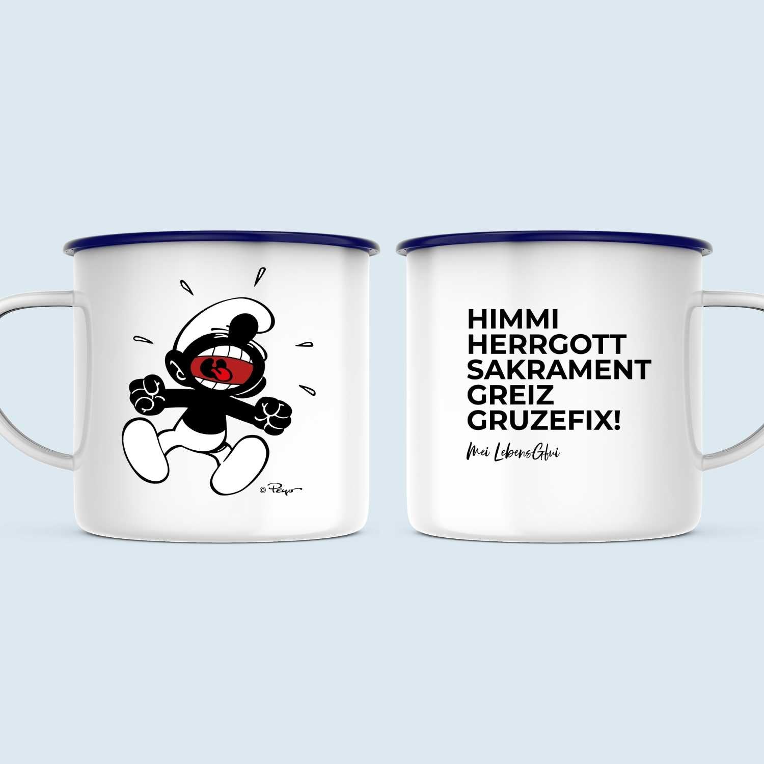 Weiße Emailletasse mit blauem Rand und „Himme Herrgott!“ Schriftzug sowie Schlumpf-Motiv, ca. 330 ml.