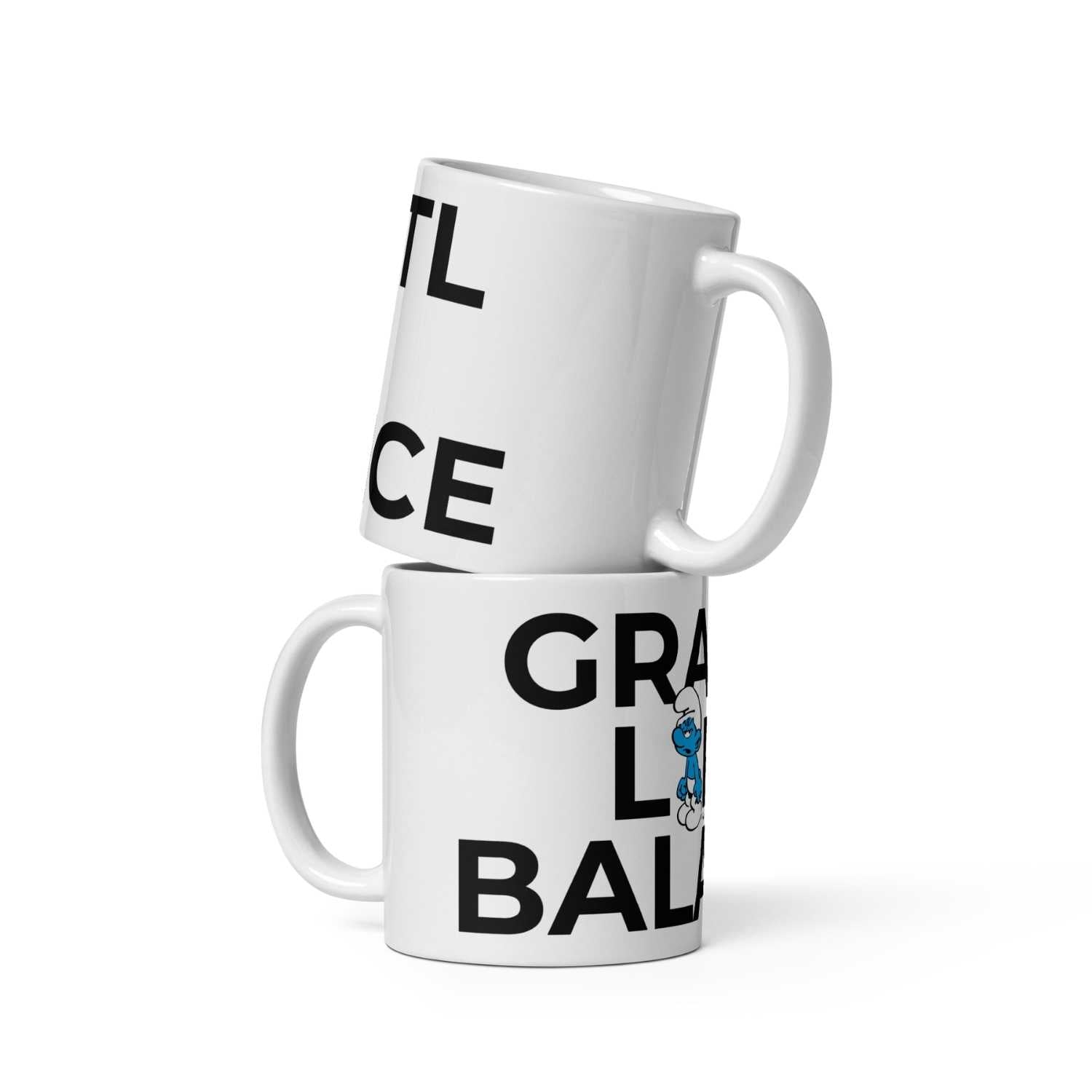 Porzellantasse mit Schlumpf-Motiv und Schriftzug „Grantl life balance“, Druck gegenüber dem Henkel, 330 ml.