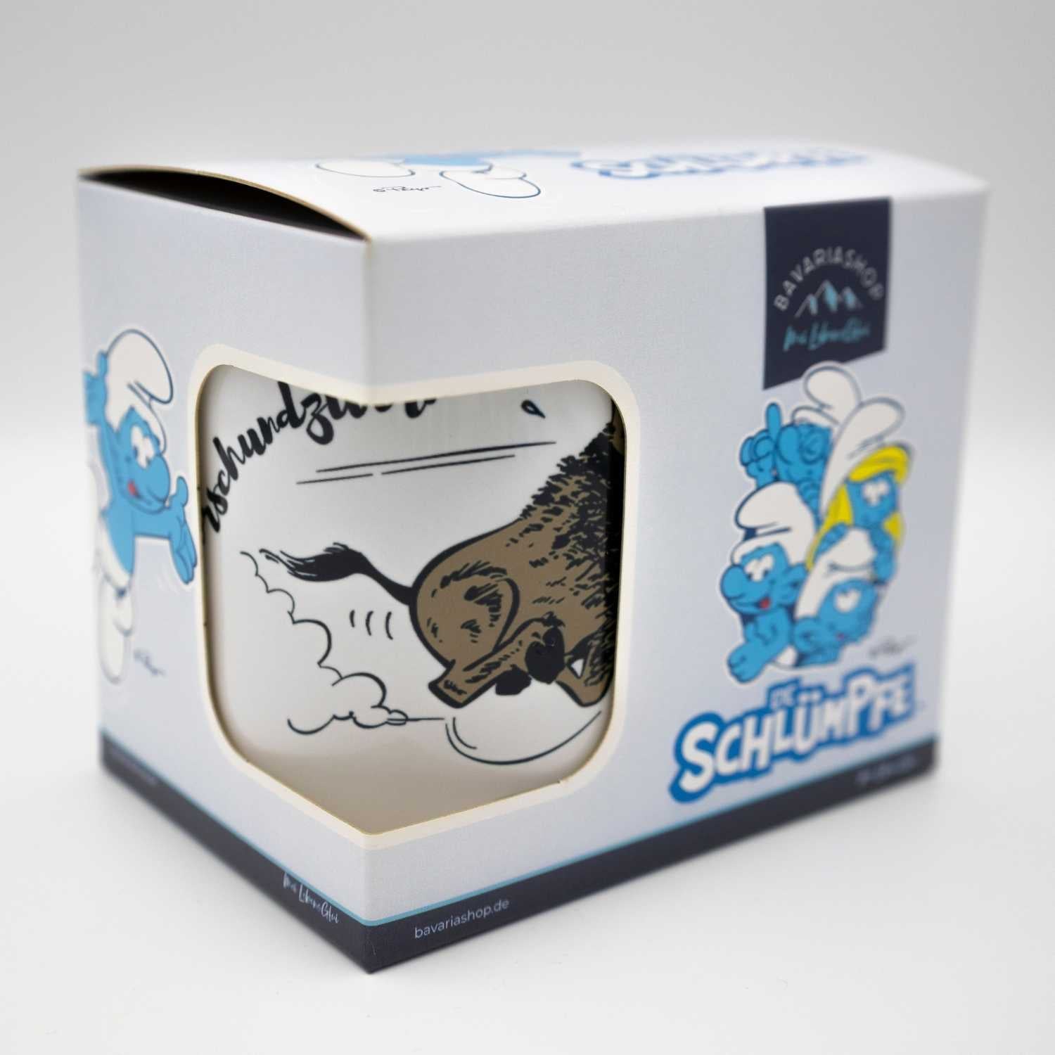 Porzellantasse mit Henkel, Vorderseite bedruckt mit „Die Schlümpfe“-Motiv und Schriftzug „Himmeorschundzwirn“, 330 ml.