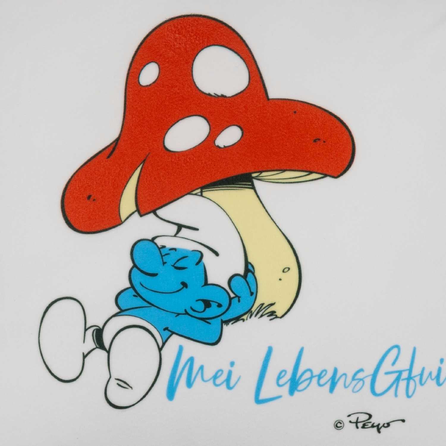 Quadratisches Kuschelkissen mit Schlumpf-Motiv und dem aufgedruckten Spruch „Do legst di nieda!“, weich gepolstert.