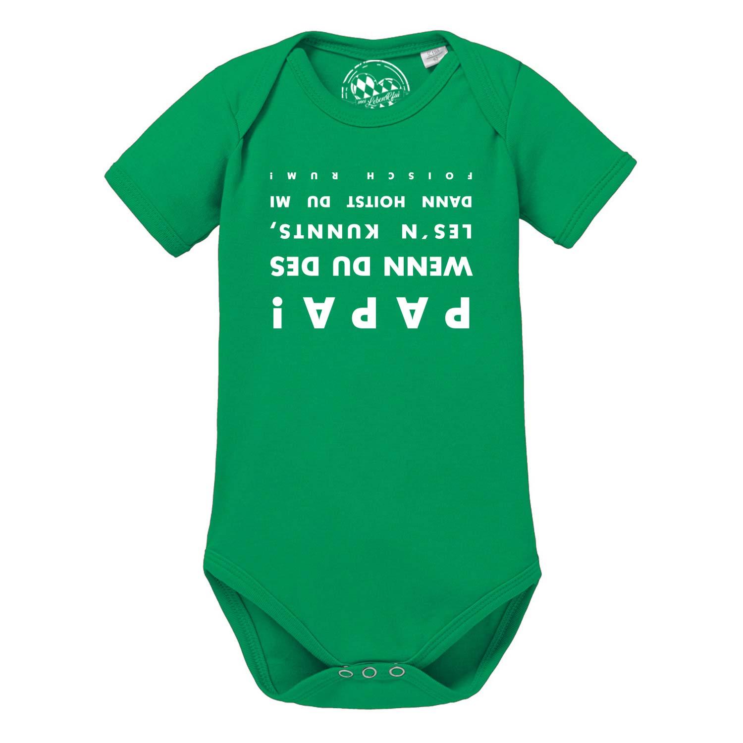 Weißer Babybody mit kurzen Ärmeln, humorvollem Aufdruck „Du ziehst mich falsch rum an“ in Schwarz, aus Baumwolle.