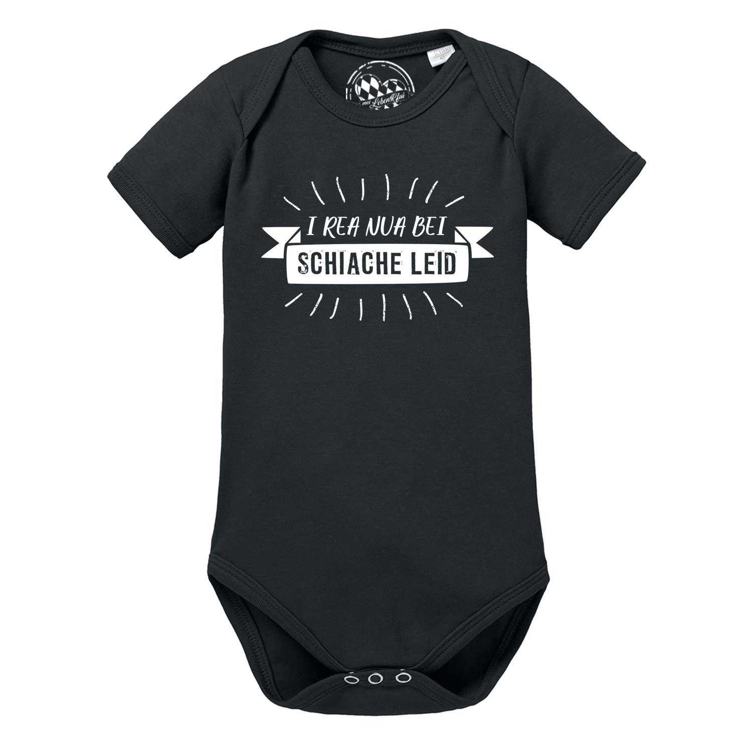 Weißer Baby-Body mit kurzem Arm, vorne bunter Schriftzug „I rea nua...“, weiche Baumwolle, Rundhalsausschnitt.