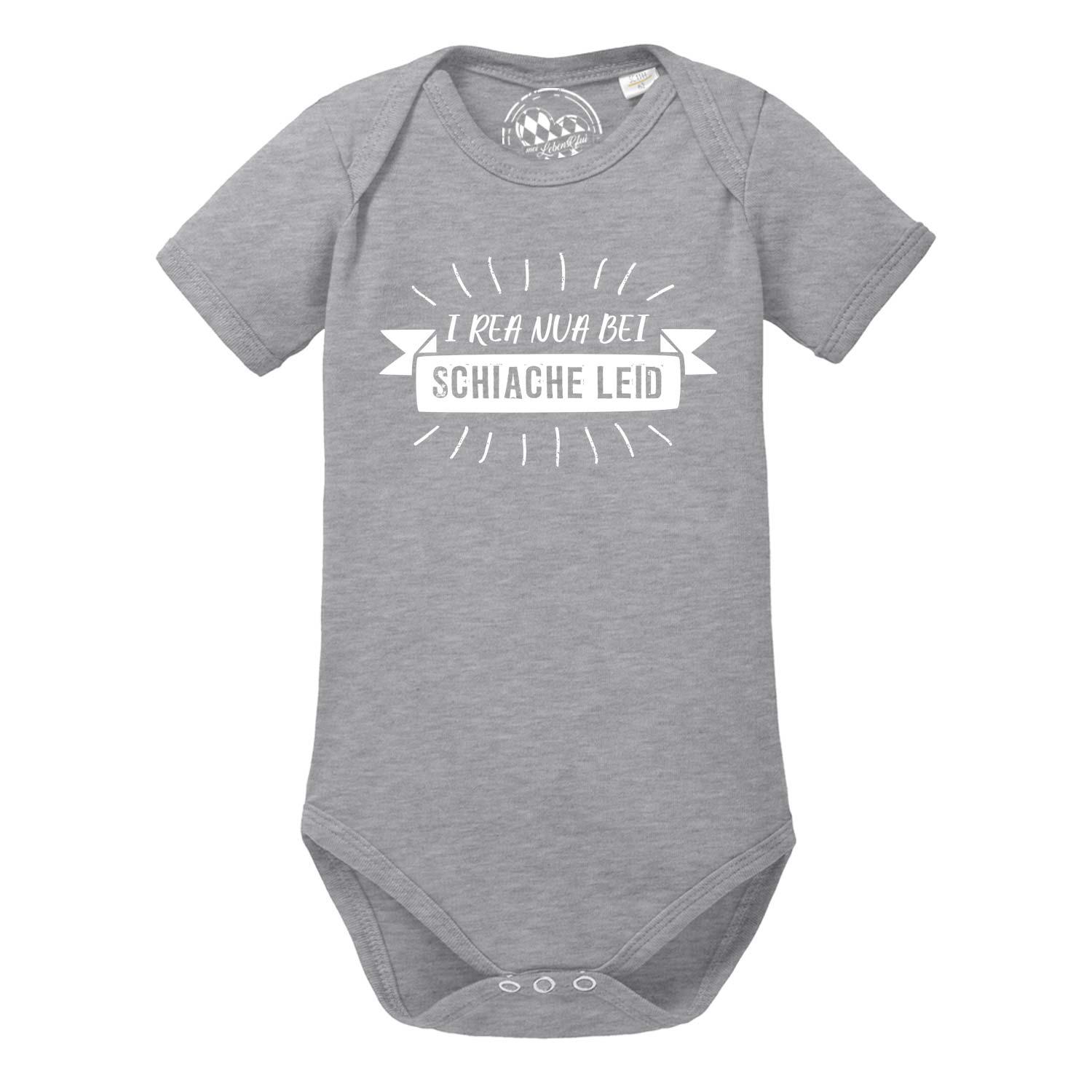 Weißer Baby-Body mit kurzem Arm, Aufdruck „I rea nua“ in Blau, Schriftzug mit Herz-Motiv, aus Baumwolle.