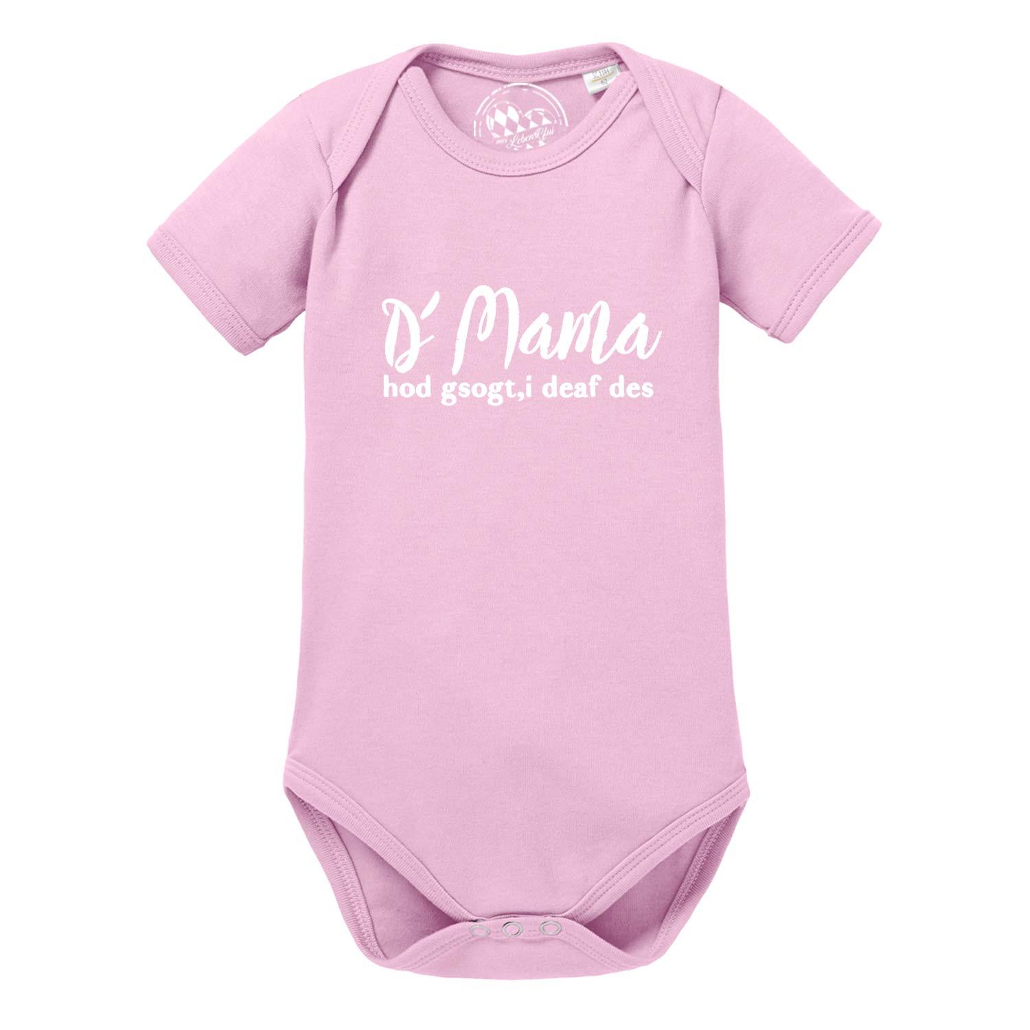 Weißer Baby-Body mit kurzen Ärmeln, schwarzem Druck „Mama sogt, i deaf des!“ und Aufdruck ®mei LebensGfui; aus Baumwolle.