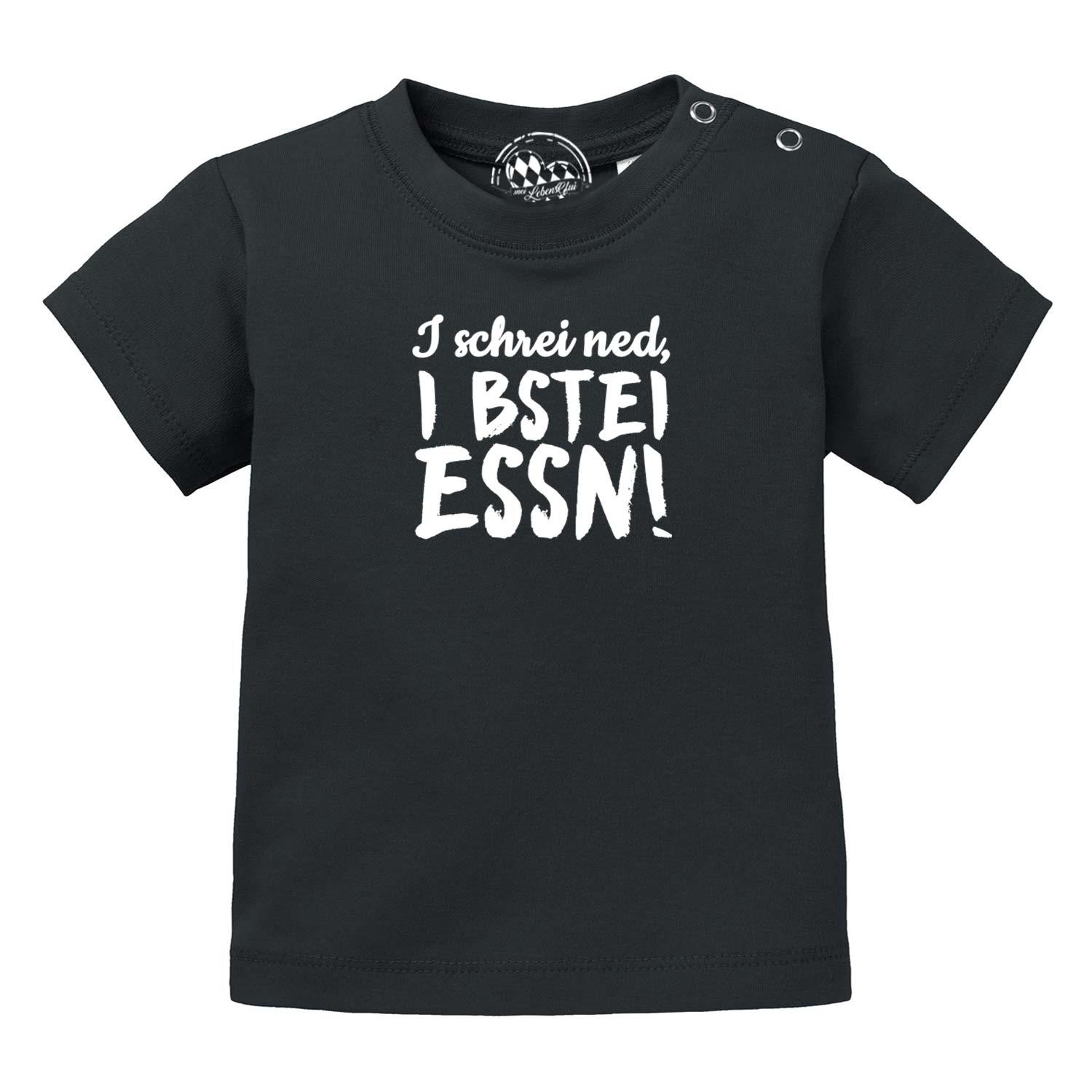 Kurzes Baby-T-Shirt in Weiß mit blauem Schriftzug „I bstei essn...“ vorne, aus 100 % Bio-Baumwolle.