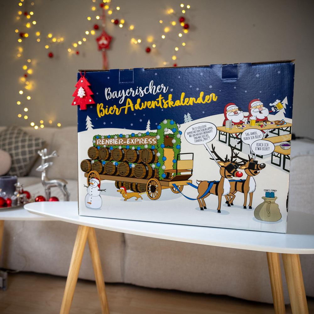 Vorderseite eines bayerischen Bier-Adventskalenders mit "Renbier-Express"-Motiv und Weihnachtsbeleuchtung.