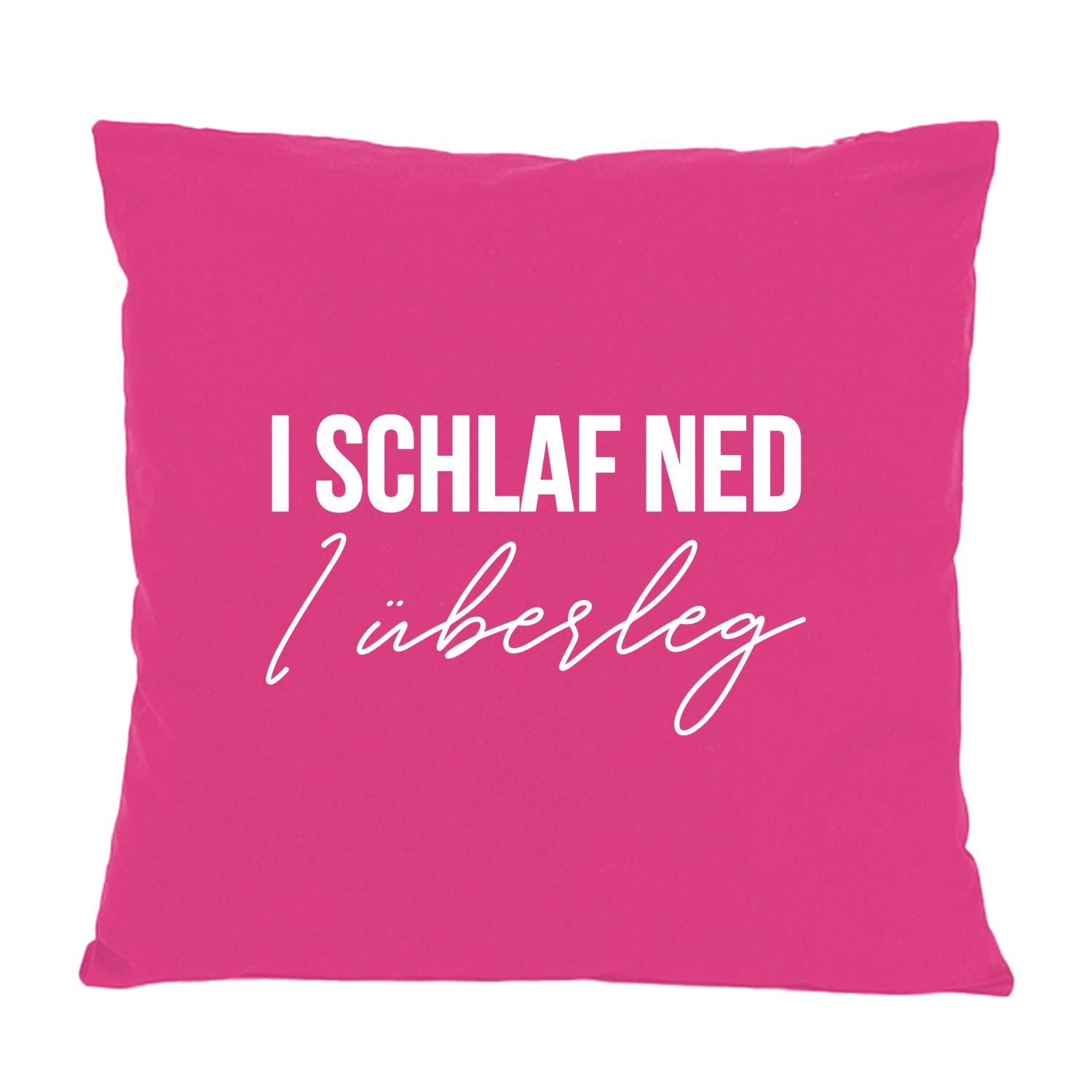 Kissen I schlaf ned, I überleg in leuchtendem Pink mit weißem Spruch. Modernes Schlafzimmer-Accessoire.