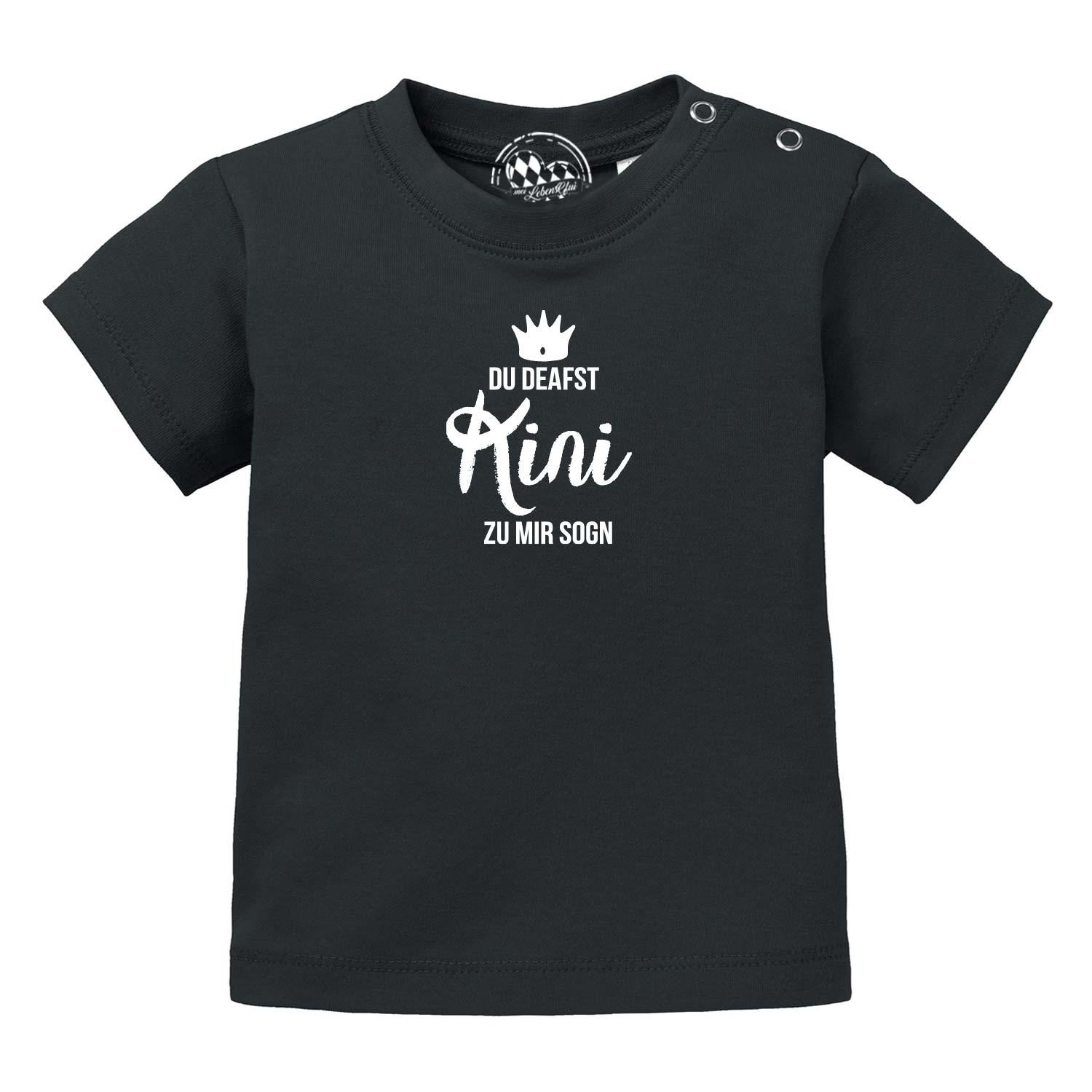 Baby T-Shirt Kini in Schwarz mit lustigem weißen Spruch "DU DEAFST Kini ZU MIR SOGN" und Krone.