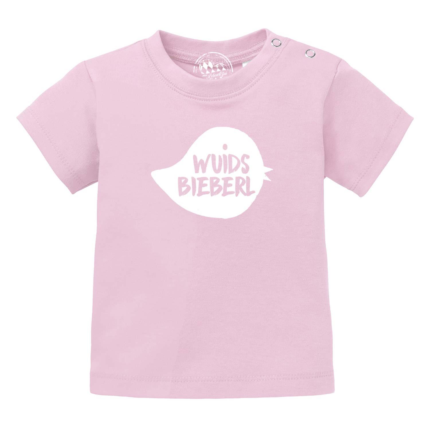Baby T-Shirt Wuids Bieberl in Rosa mit weißem Vogel-Aufdruck und Druckknöpfen an der Schulter.