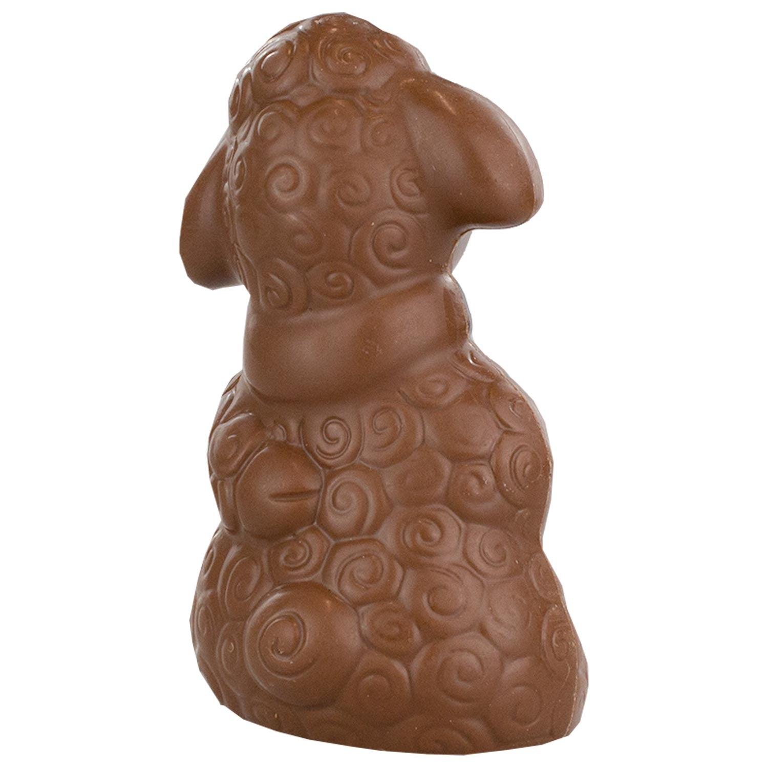 Vollmilch-Schokoschaf in Schafform, verziert mit weißer und Zartbitter-Schokolade, ca. 10 × 5,5 cm, 70 g.
