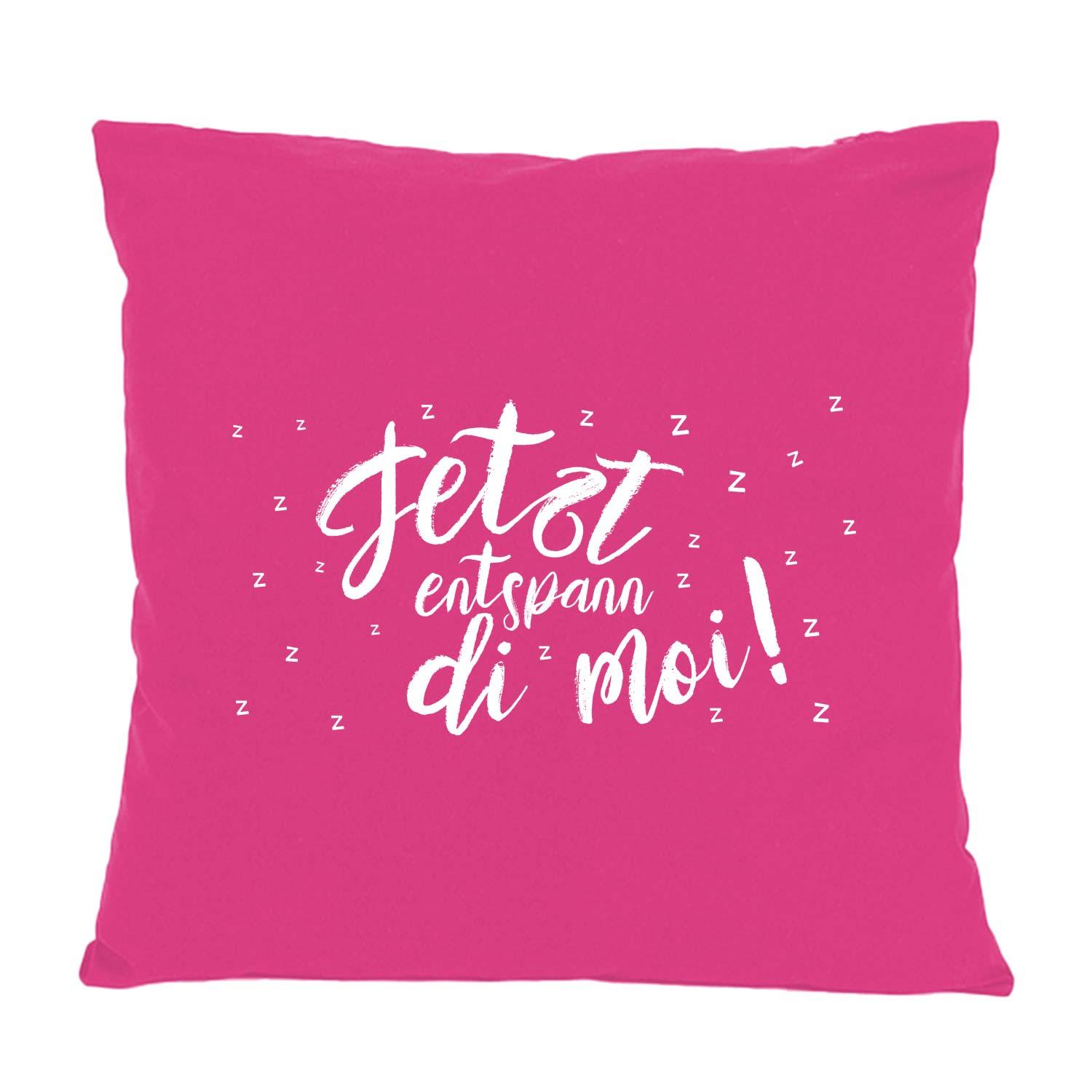 Fuchsiafarbenes Kissen "Entspann di moi..." mit weißem Schriftzug und kleinen Zzz-Symbolen.