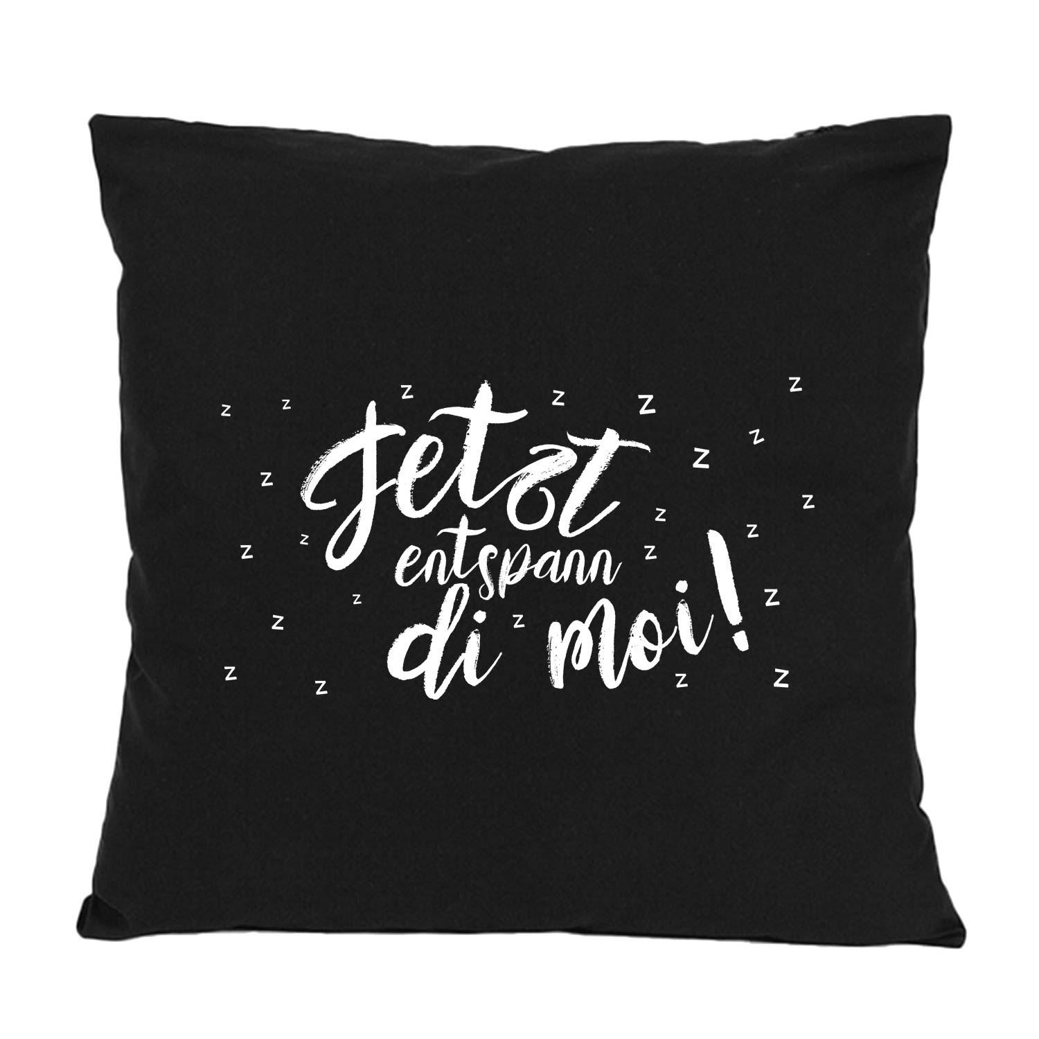 Schwarzes Kissen "Entspann di moi..." mit weißem Schriftzug und kleinen Z-Symbolen für Schlaf, Komfort.