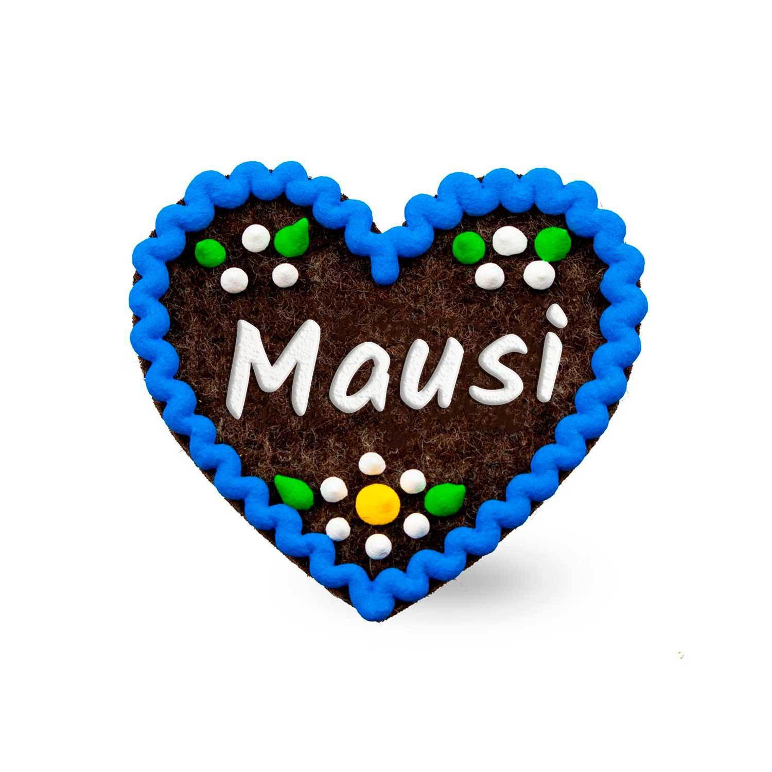 Herzförmiger Filzanstecker mit gesticktem Schriftzug „Mausi“, Sicherheitsverschluss auf der Rückseite, ca. 6,5 x 7 cm.