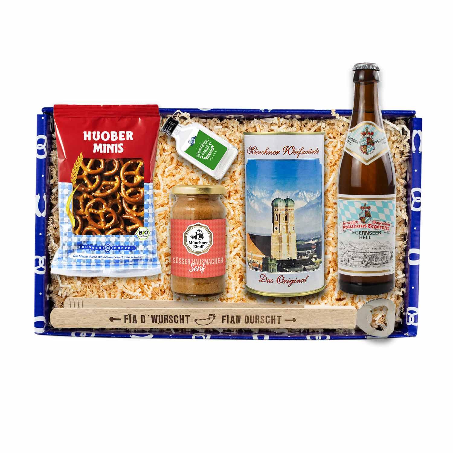Bayerisches Geschenkset mit 4 haltbaren Weißwürsten, 0,33l Tegernseer Bier und Weißwurschtzange mit Öffner.