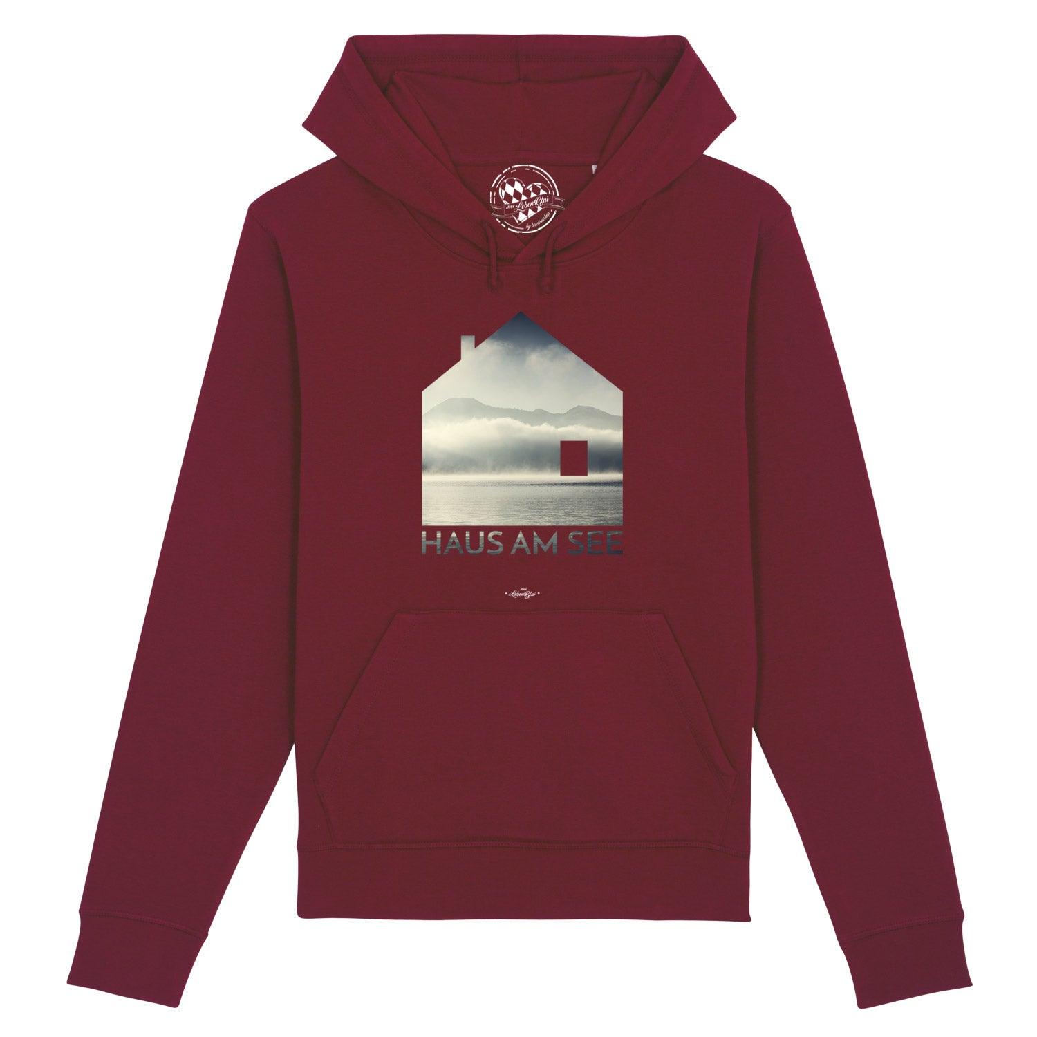 Dunkelblauer Herren-Hoodie mit weißem Schriftzug „Haus am See“, Kapuze, Kängurutasche, Bio-Baumwolle, Unisex-Schnitt.
