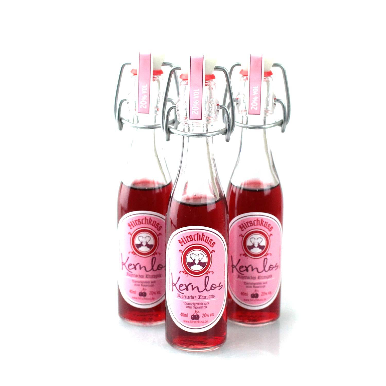 Zwetschgenlikör mit 20 % vol., klarrot in kleiner Glasflasche, frontaler Schriftzug „Kernlos“, Inhalt 0,04 l.