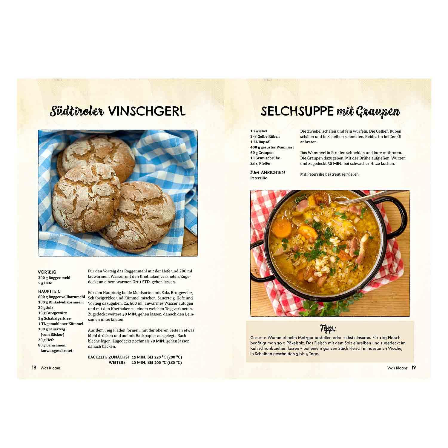 Kochbuch mit braunem Hardcover, weißem Schriftzug „Hüttenküche für Dahoam“ und gezeichnetem Hirschkopf-Motiv.