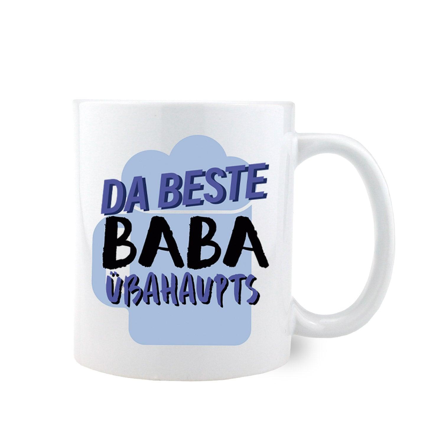 Weiße Keramiktasse mit schwarzem Henkel und Aufdruck „Da beste Baba übahaupts“, ca. 330 ml, spülmaschinengeeignet.
