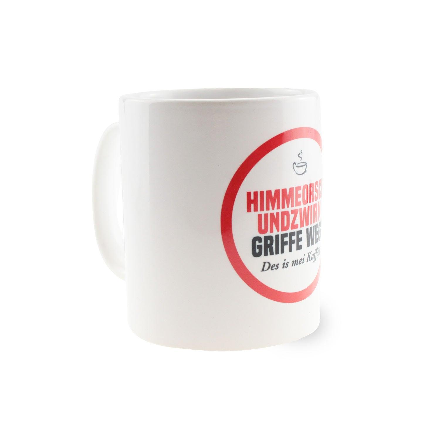 Weiße Keramiktasse mit schwarzem Henkel, rotem Herz und Aufdruck „Himmeorschundzwirn, GRIFFE WEG...“, ca. 330 ml, 9,6 cm hoch.