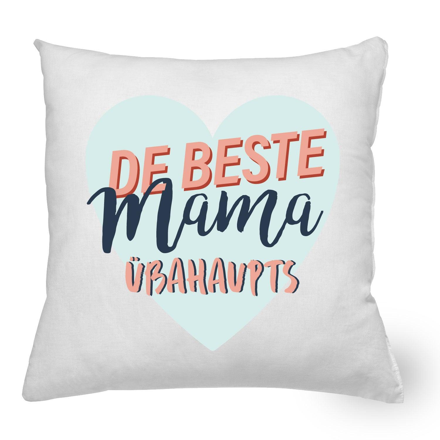 Quadratisches Dekokissen in Weiß mit schwarzem Schriftzug „De beste Mama übahaupts“, inklusive Füllung, 40 × 40 cm.
