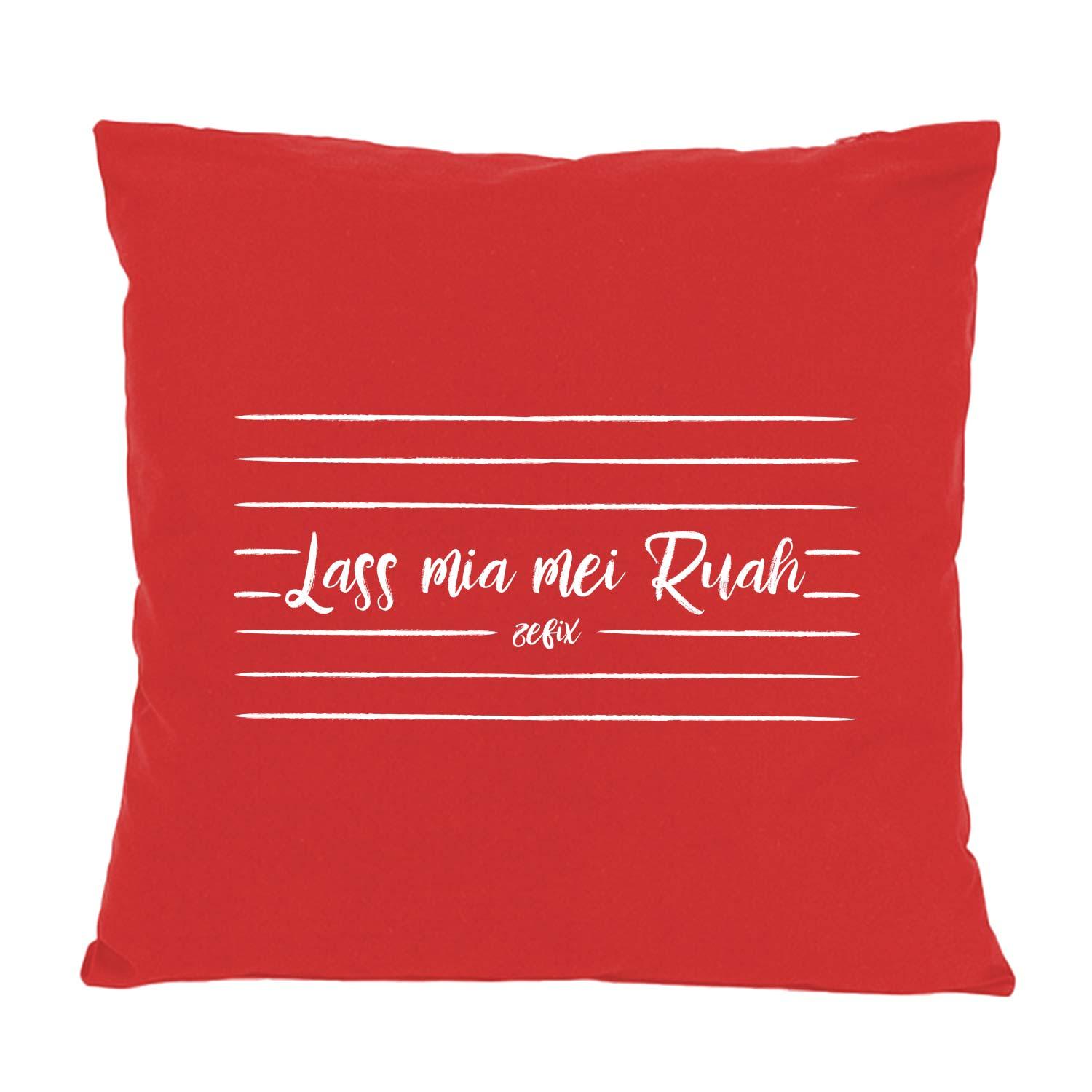 Quadratisches Dekokissen mit sichtbarem Schriftzug "Lass mia mei Ruah...", bedruckt in Bayern, aus 100 % Baumwolle.