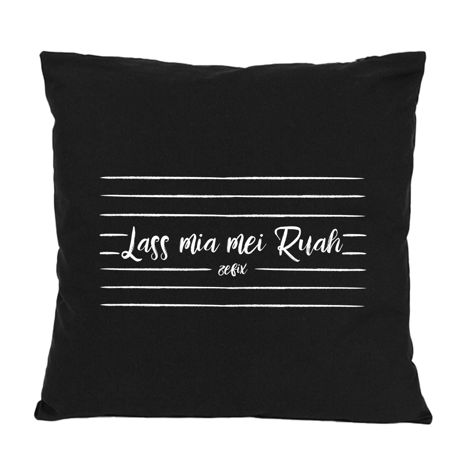 Quadratisches Dekokissen mit sichtbarem Schriftzug „Lass mia mei Ruah…“, glatte Stoffstruktur, ca. 40 × 40 cm, 100 % Baumwolle.