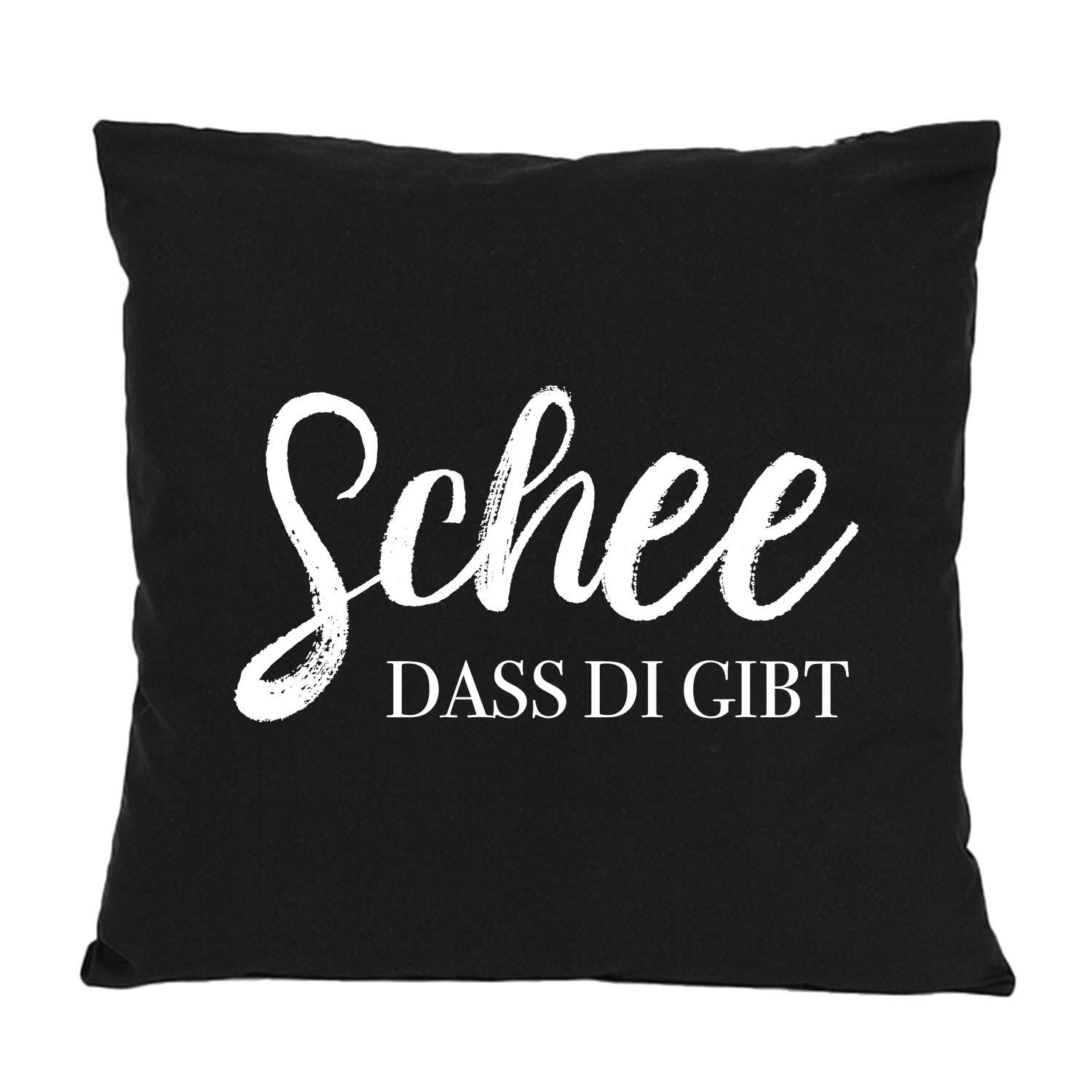 Quadratisches Dekokissen mit sichtbarem Schriftzug „Schee, dass di gibt!“, aus Baumwolle, ca. 40 × 40 cm.