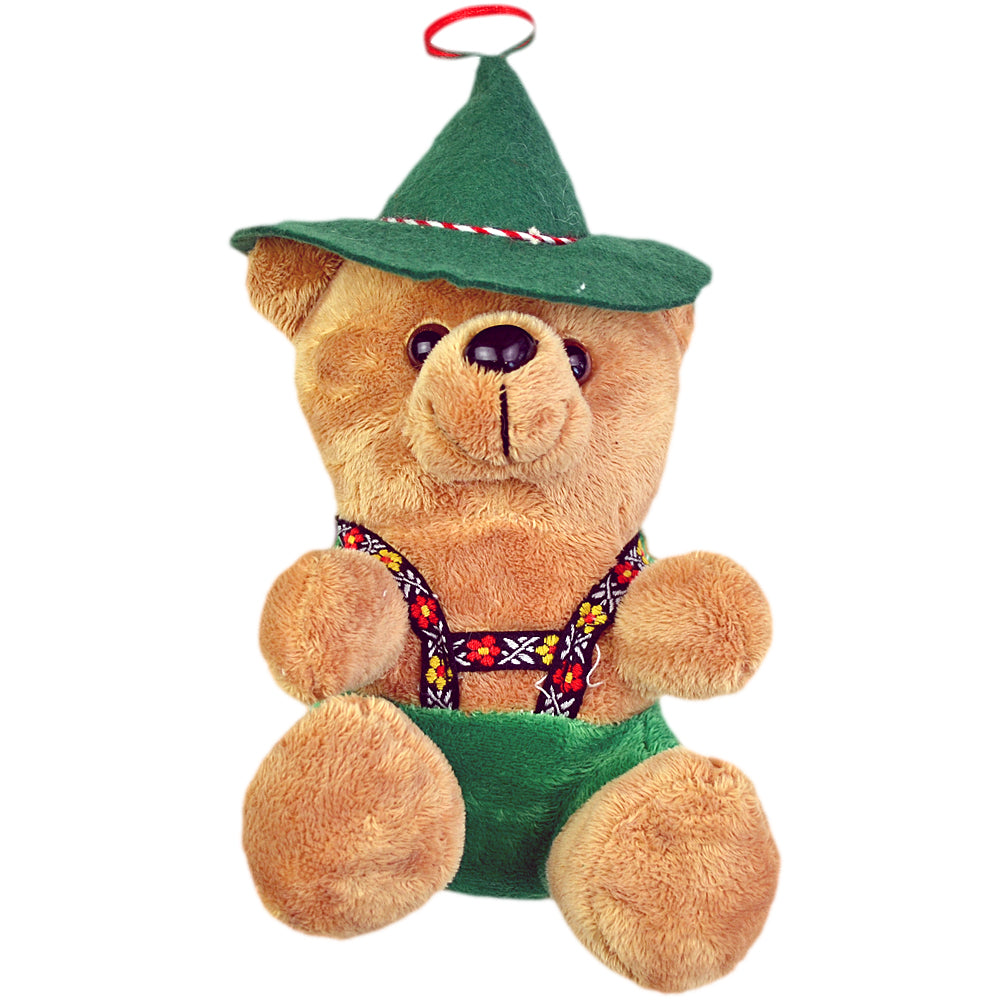 Plüschbär in brauner Lederhose mit weißem Hemd, dazu ovale Relief-Osterschokolade und Blockmalzbonbons.