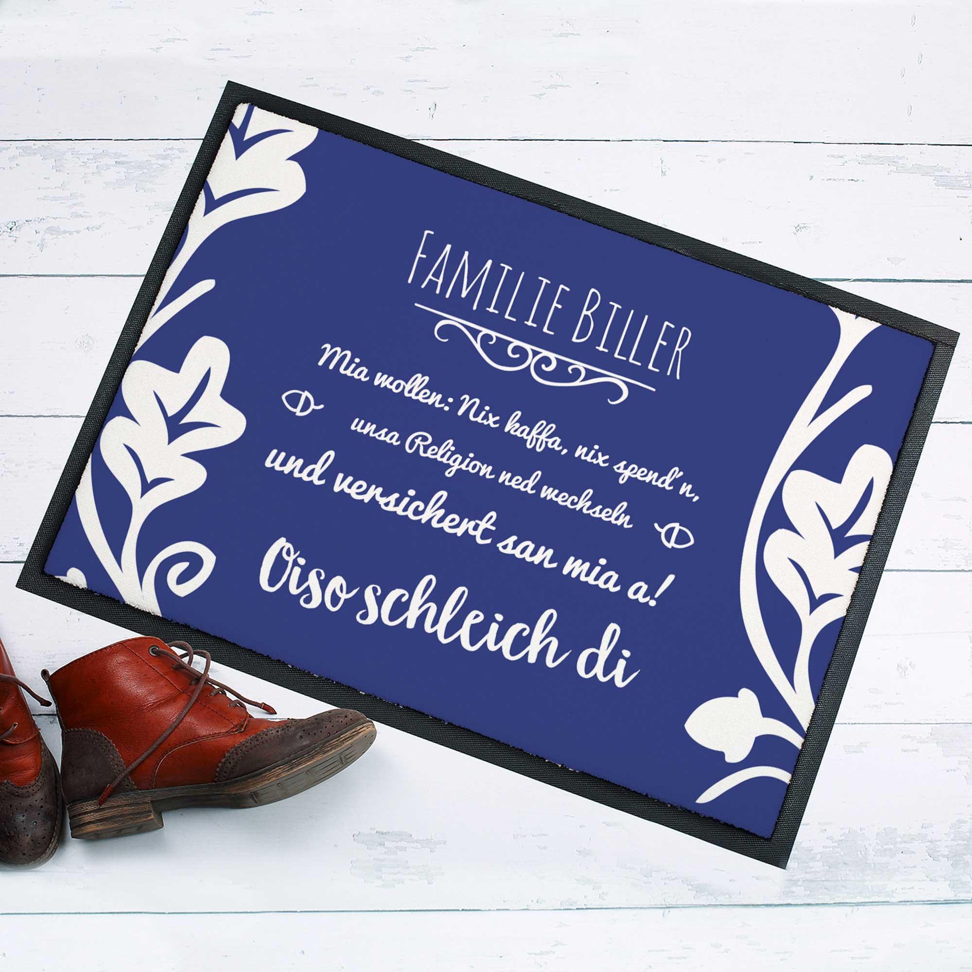Rechteckige Fußmatte mit bayrischem Motiv, Schriftzug „Schleich di!“, Edelweiß-Grafik, in Blau und Grau, Polyestervlies.