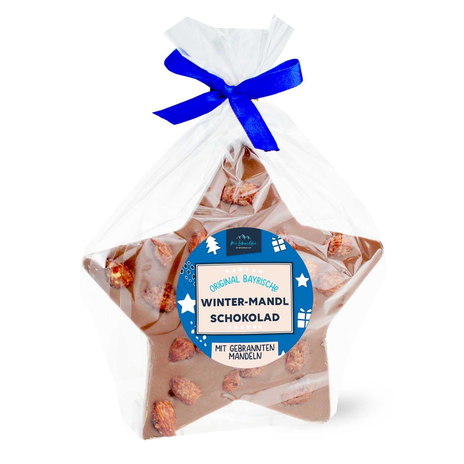 Sternförmige Vollmilchschokolade mit handgerösteten, karamellisierten Mandeln, 100 g.