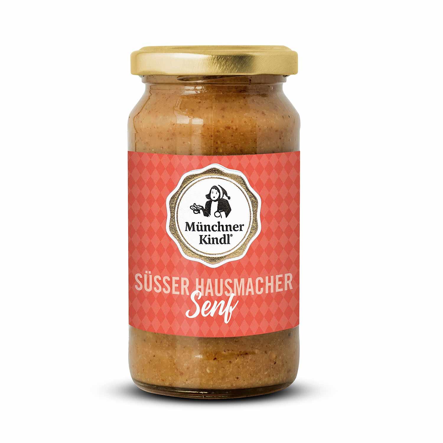 Cremiger, goldbrauner Hausmachersenf mit sichtbaren Senfkörnern in leicht grober Konsistenz in Glasbehälter.