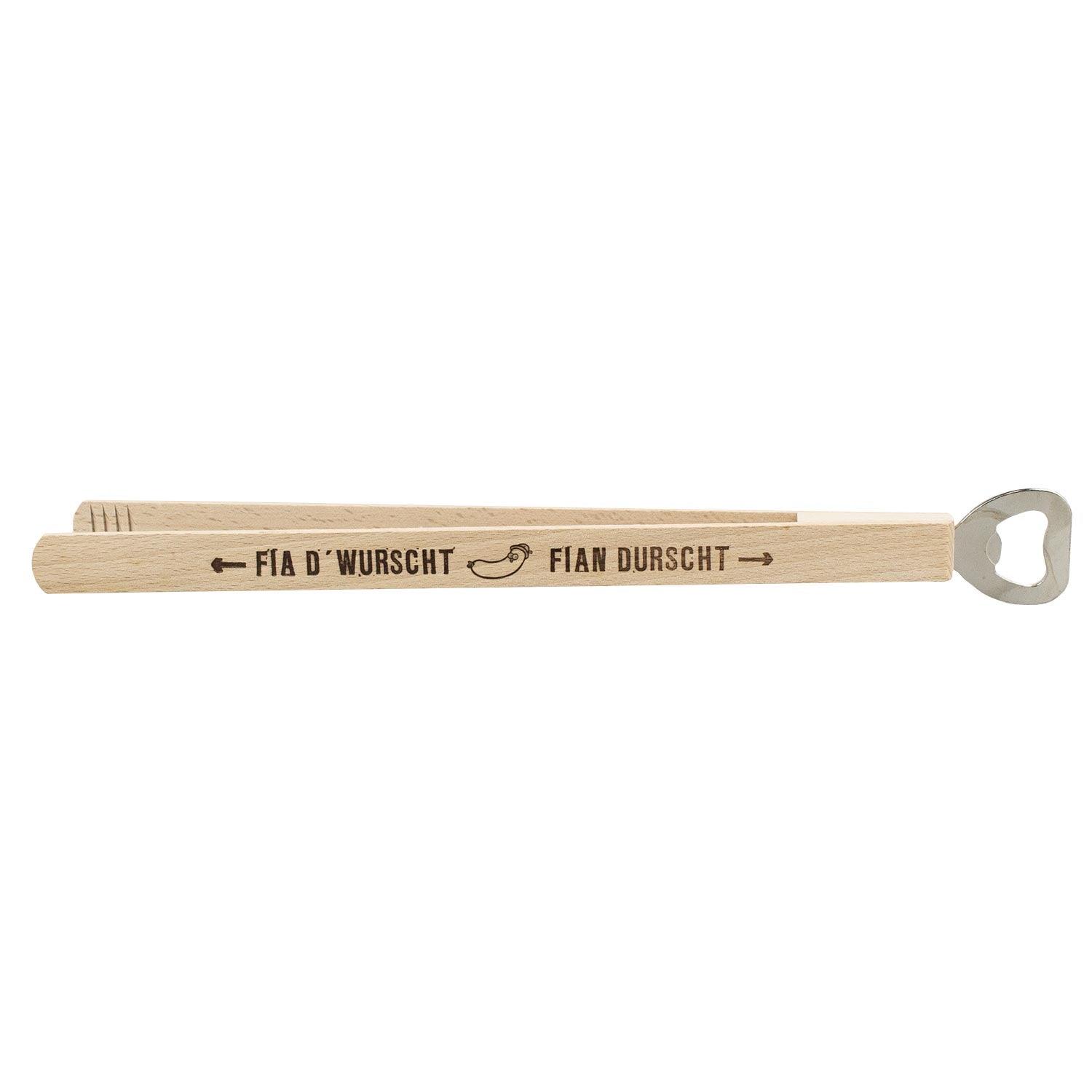 Metallene Wurstzange mit geschwungenen Greifflächen und blauem Schriftzug „Fia d’Wurscht. Fia’n Durscht.“